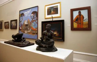 Anton van Wouws bronze sculptures in the foreground with Wayne Barkers Blue Colonies