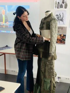 BFA Fashion Design student Andrea Freydig presenting their design